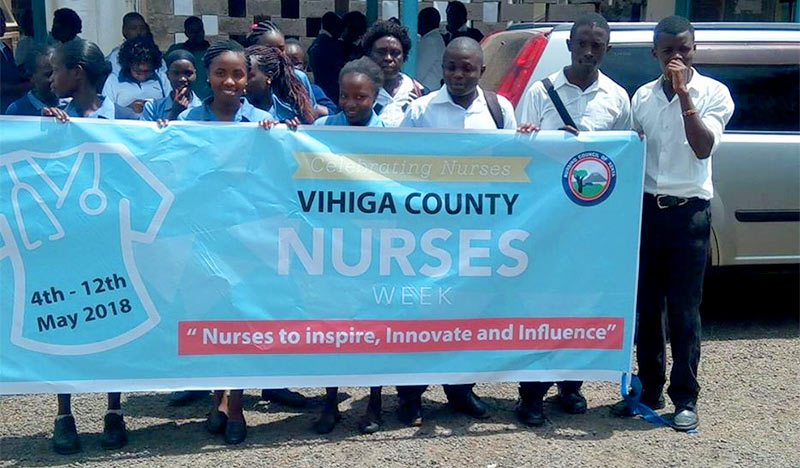 Kenyan Nurses with banner