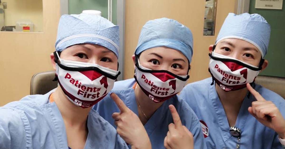Three nurses inside wear masks reading "Patients First"