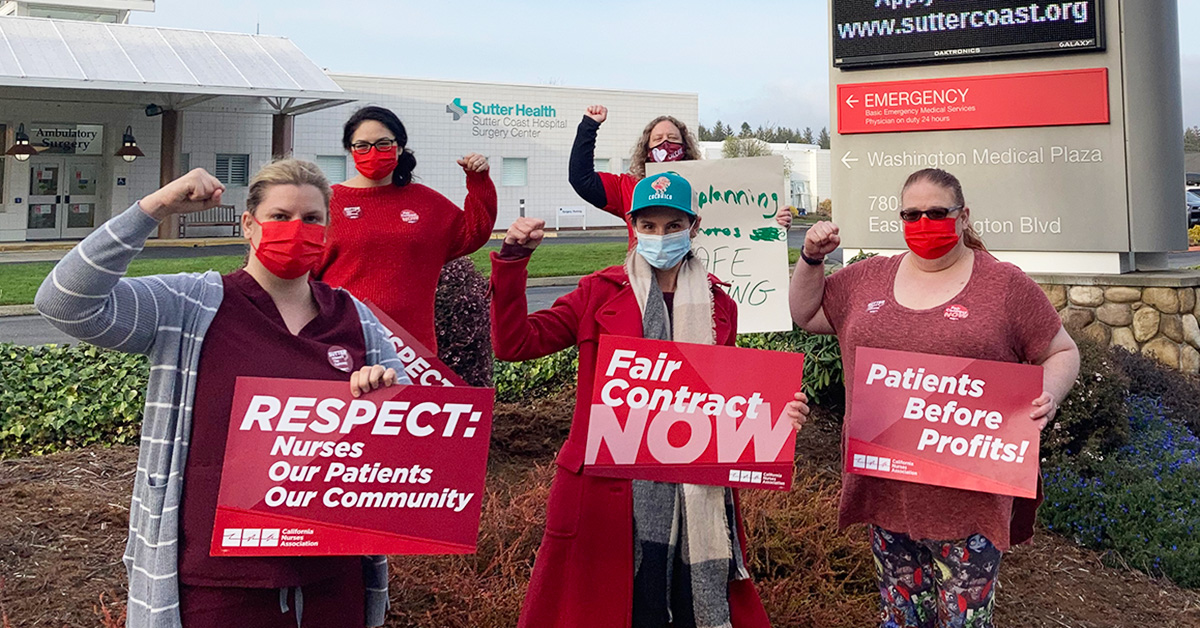 Group of nurses outside Sutter hospital with signs "Fair Contract Now!"