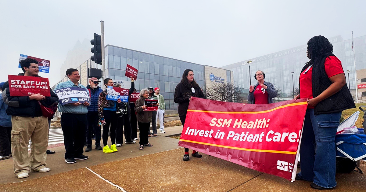 Nurses rallying with banner "SSM Health: Invest in Patient Care!" and sign "Staff up for safe care!"