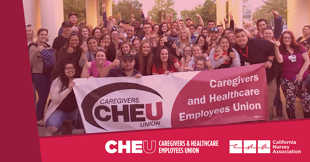 Group of workers holding CHEU banner, CHEU and CNA logos