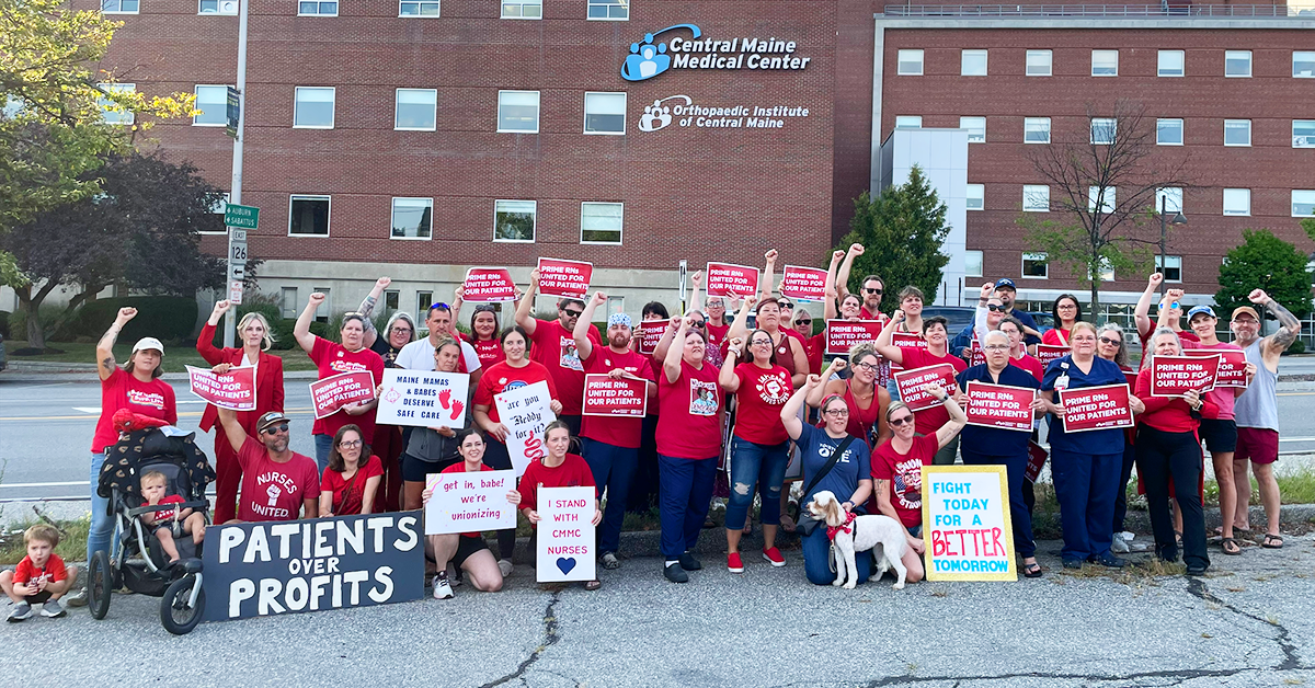 Cental Maine Medical Center nurses raising fists and holding signs "Prime RNs united for our patients."