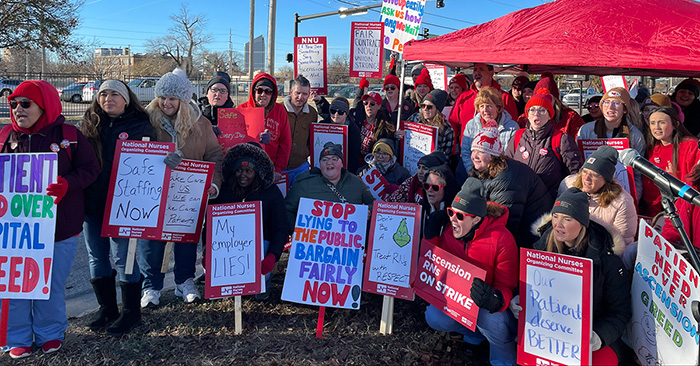 Large group of nurses holding picket