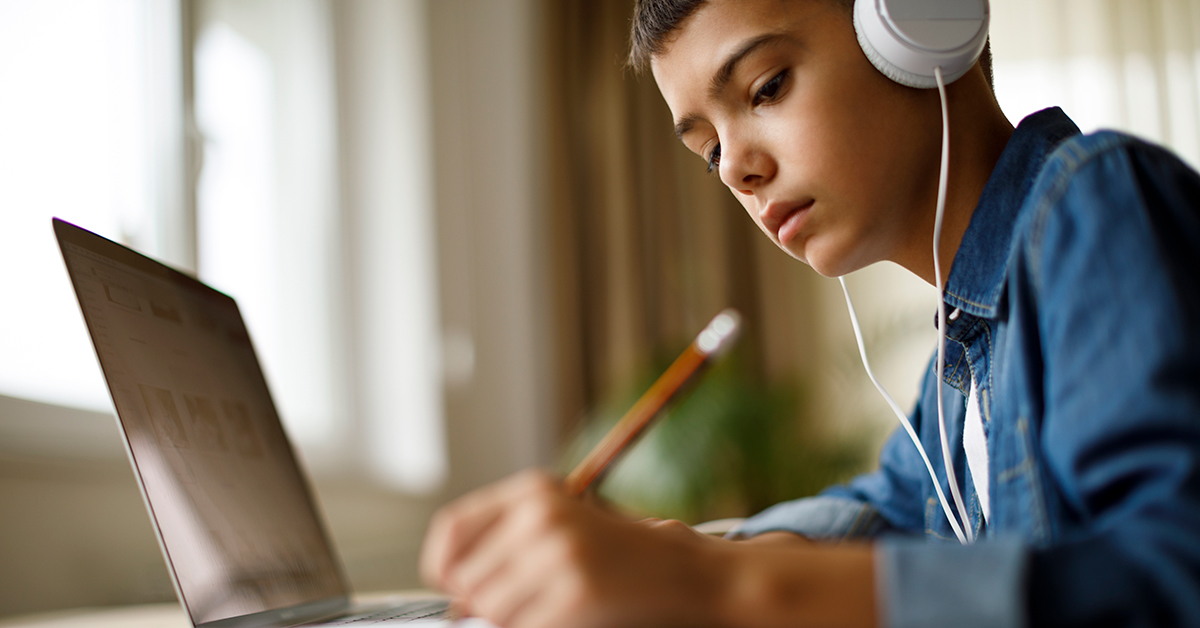 Child doing schoolwork at home