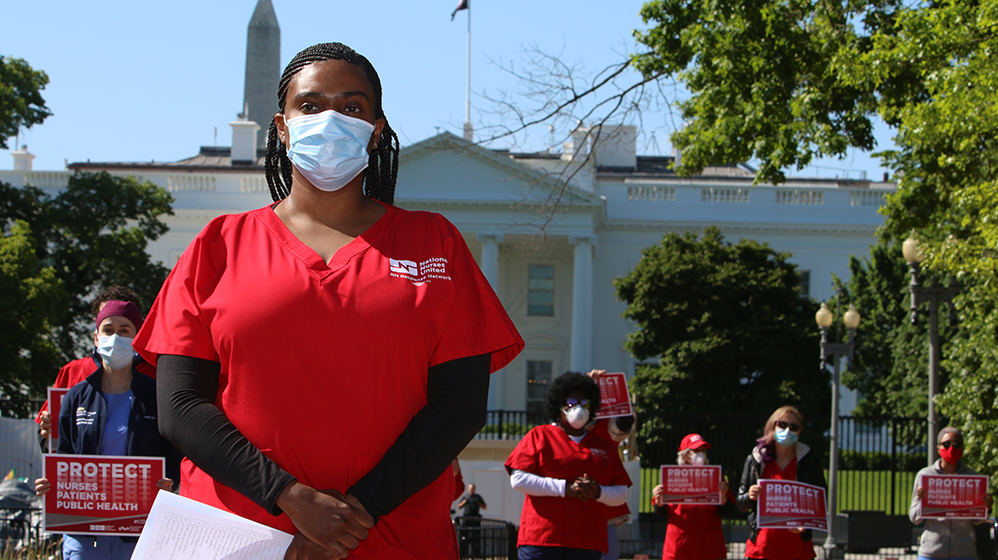 Nurse in front of whitehouse