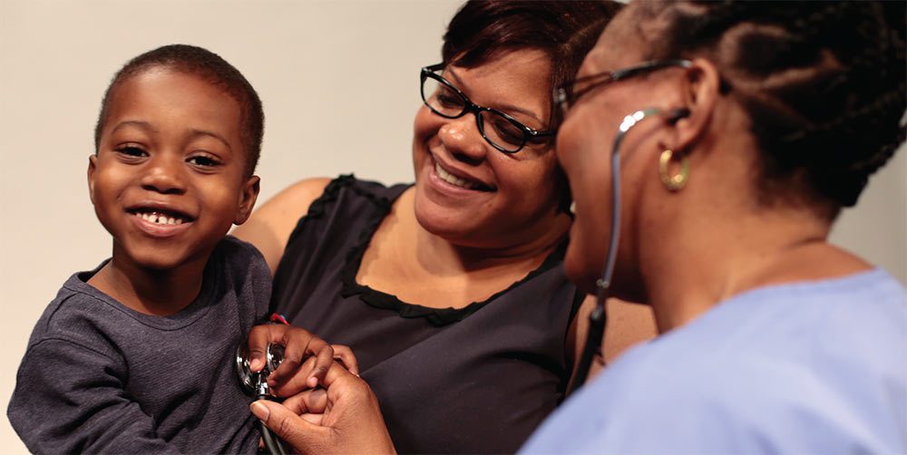 Child being see by nurse