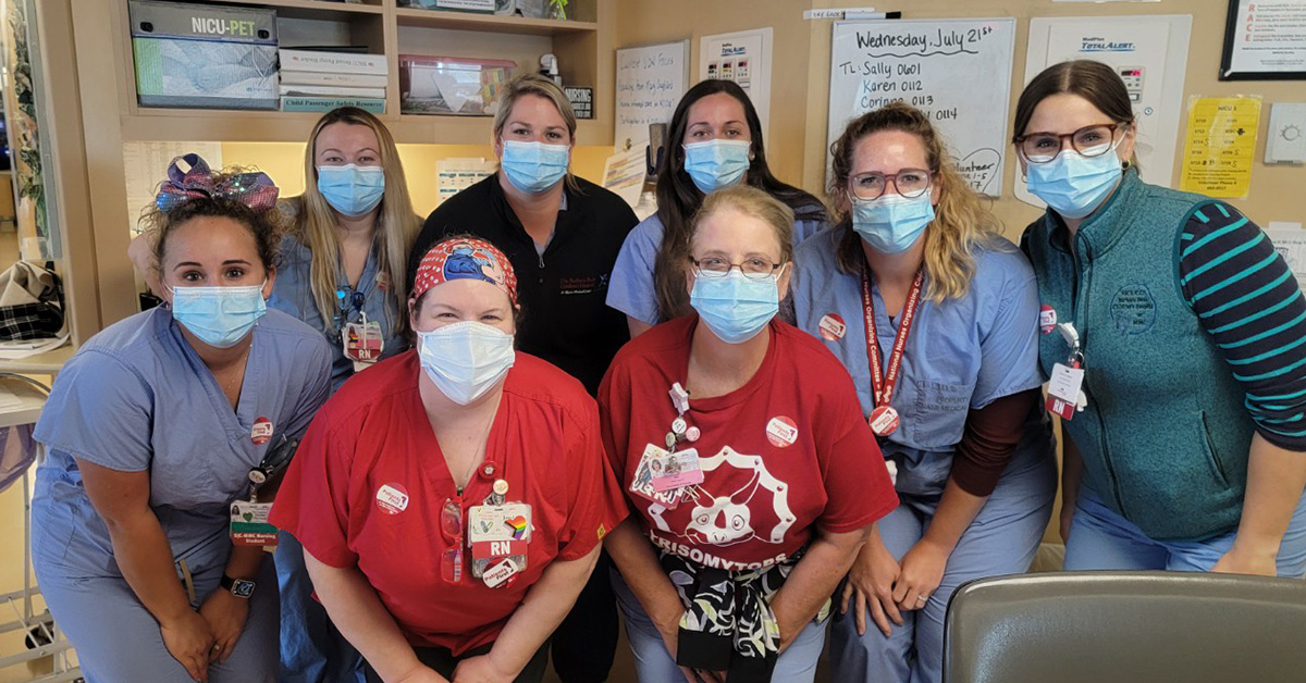 Large group of Maine Medical Center nurses inside the hospital