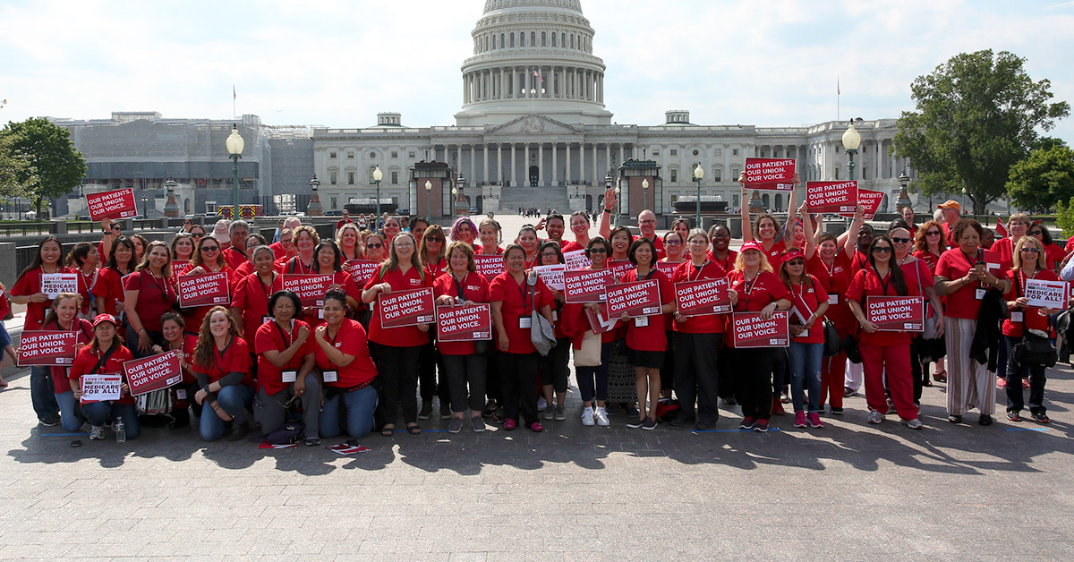 Large group of nurses outside U.S. Capitol building