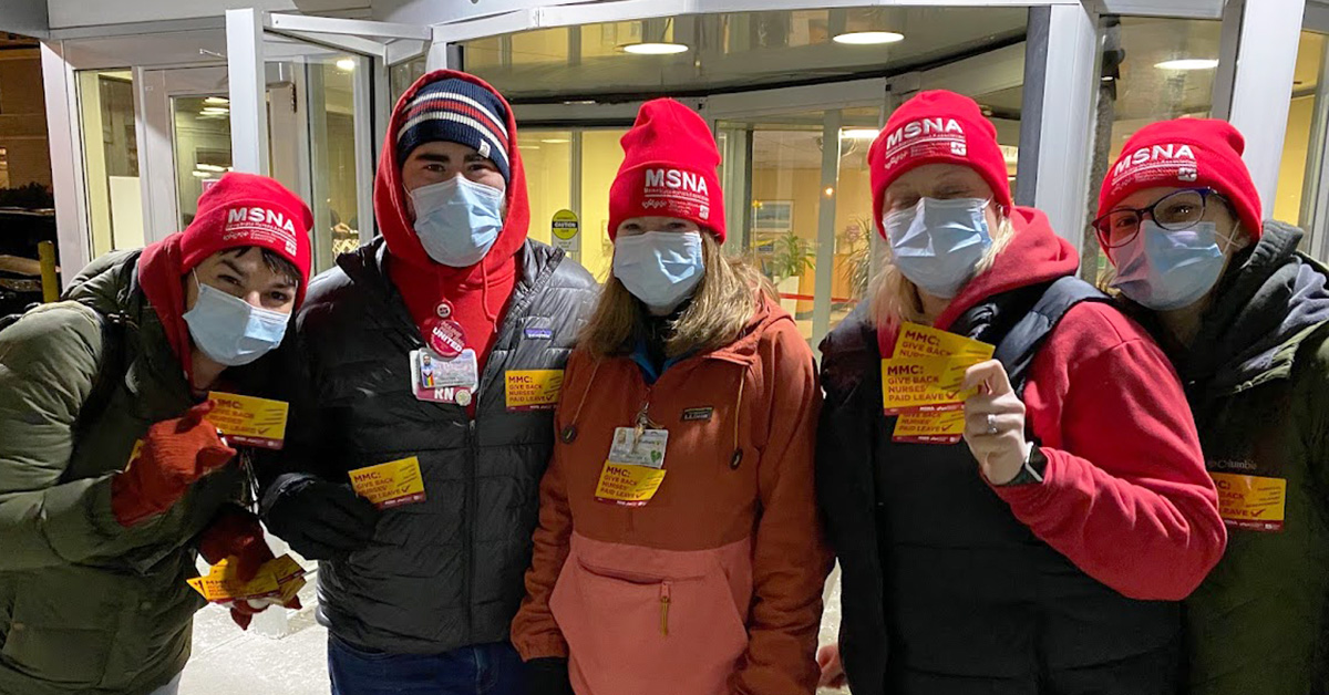 Group of nurses outside hospital wearing MSNA hats