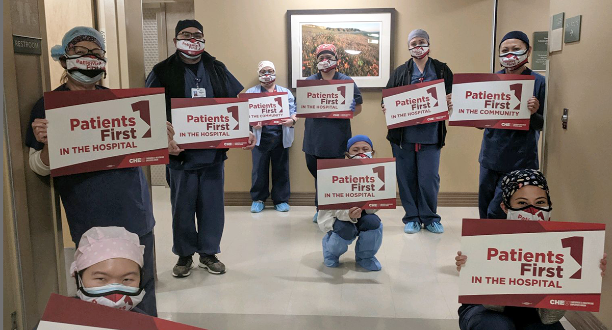 Arcadia health care workers hold signs "Patients First"