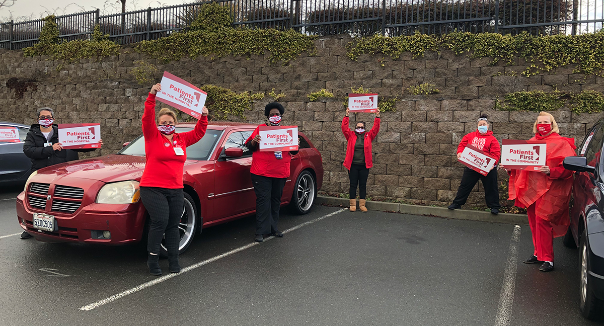 Sutter Solano nurses hold signs "Patient's First"