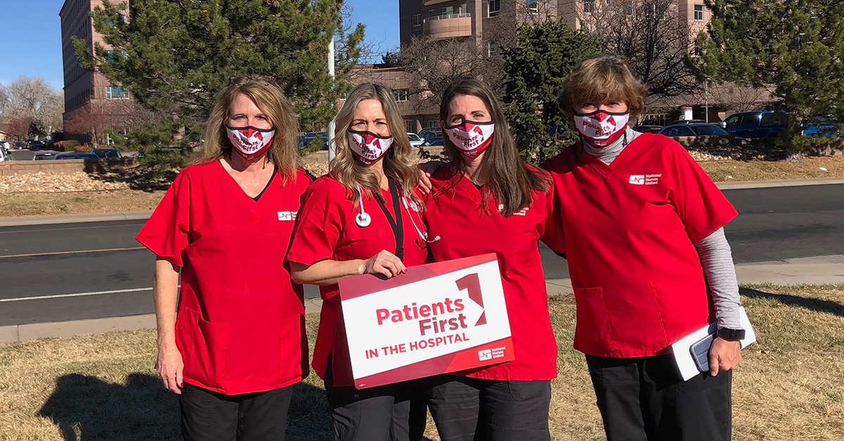 Group of four nurses outside Longmont Hospital