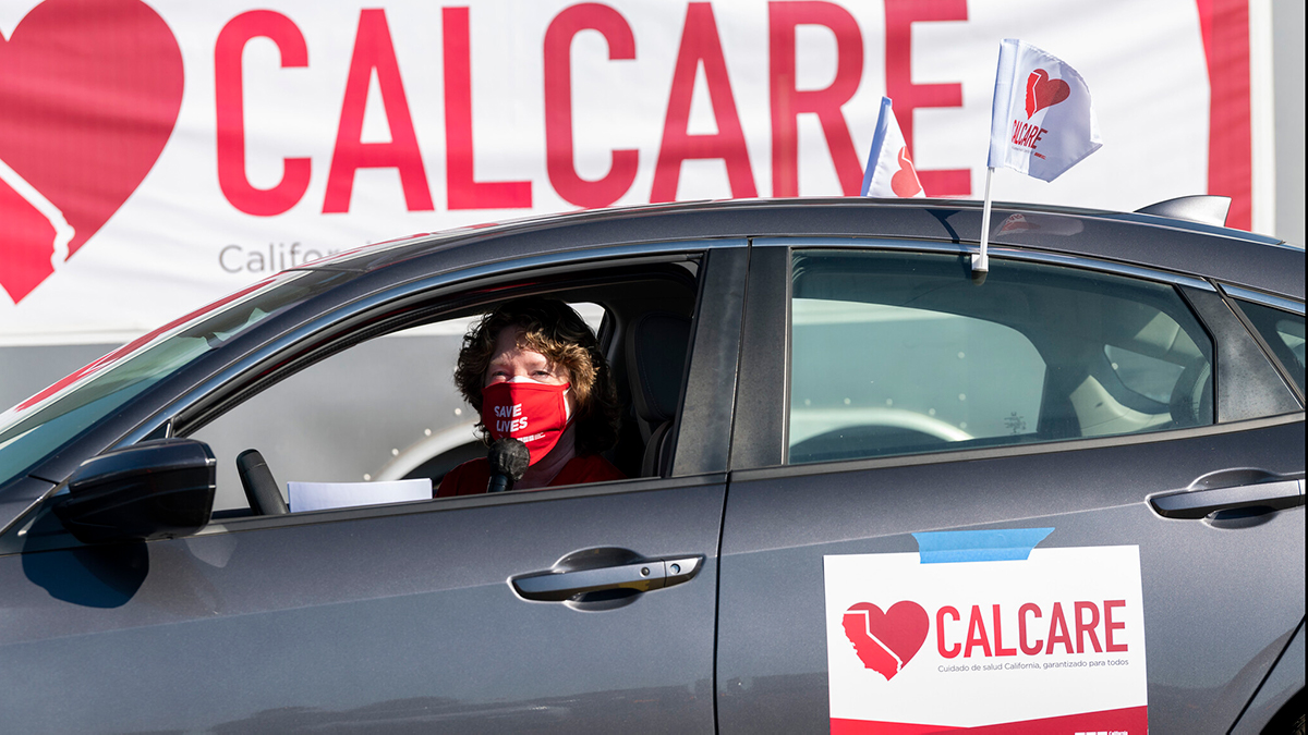 Nurse in car with CalCare sign