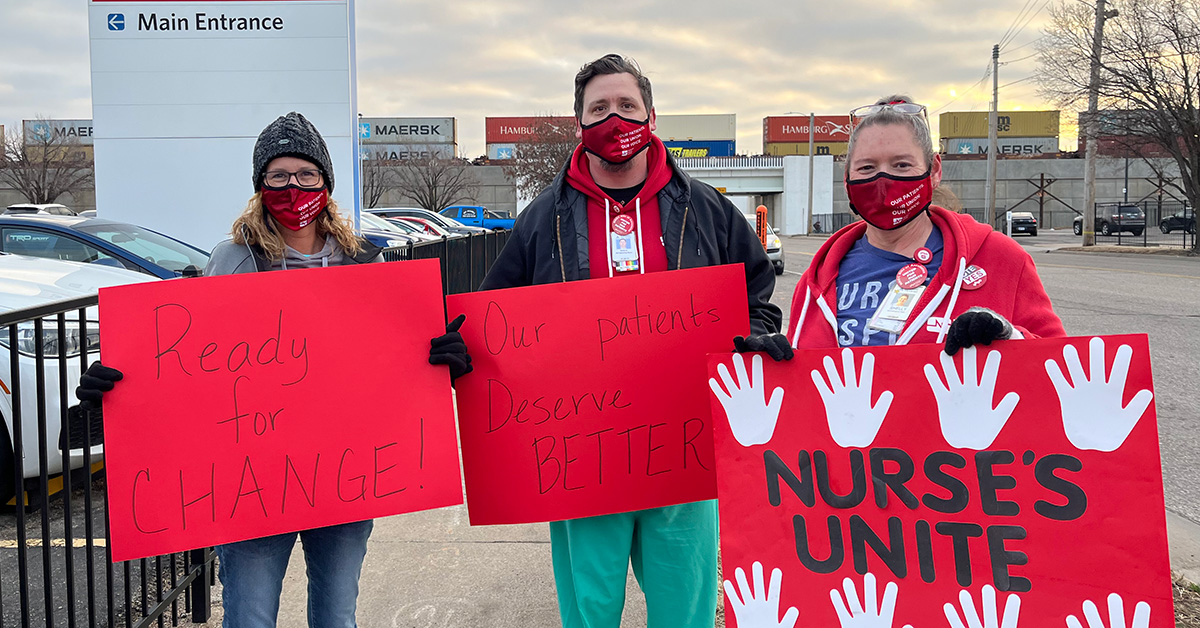 3 nurses hold signs "Ready for Change", "Our Patients Deserve Better", "Nurses Unite"