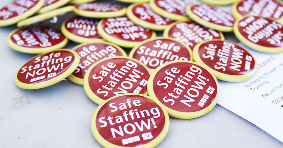 Pile of buttons that say "Safe Staffing Now!"