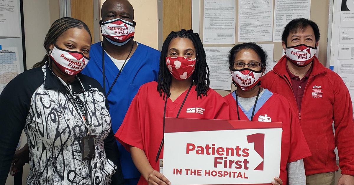 Nurses holding sign: "Patients First in the hospital"
