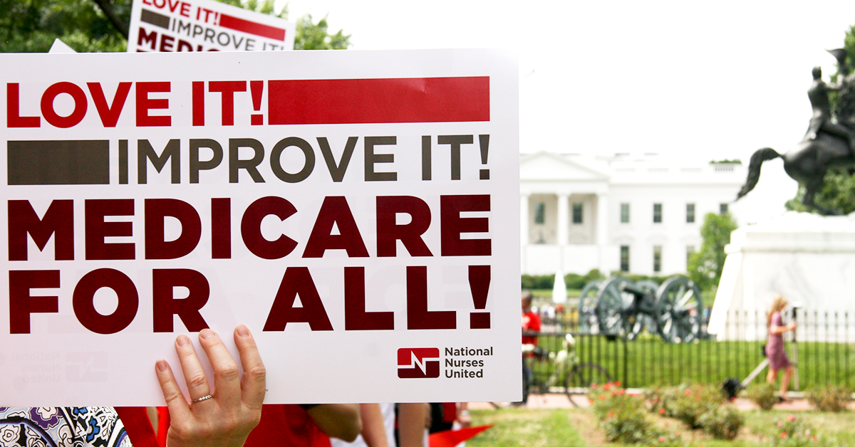Holding sign in front of a Capitol building "Love it! Improve it! Medicare for all!"