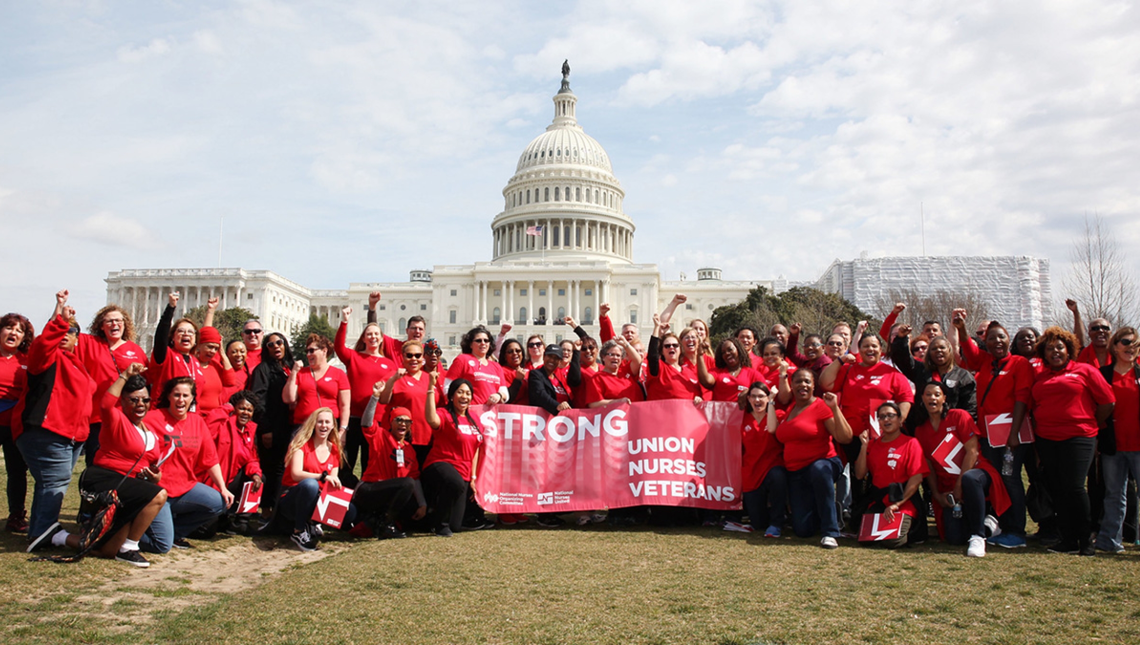 Large group of nurses outside capitol building
