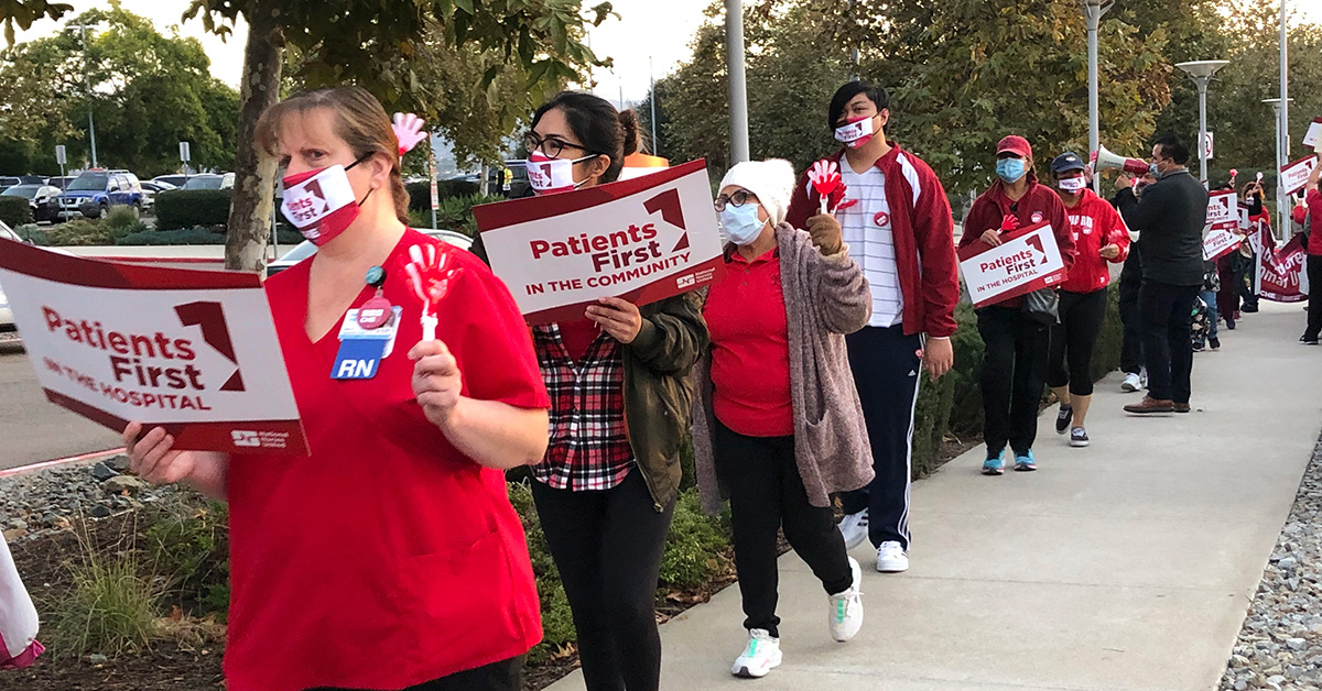 Verdugo Hills nurses picketing outside hospital with signs "Patients First"