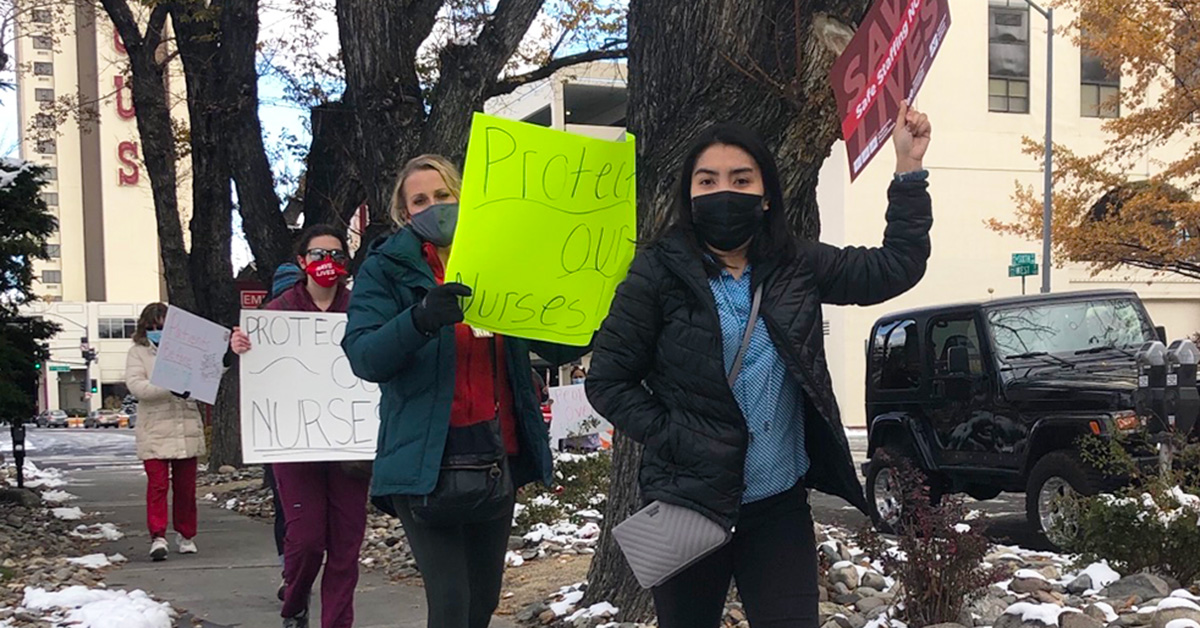 Nurses walking picket line outside hospital