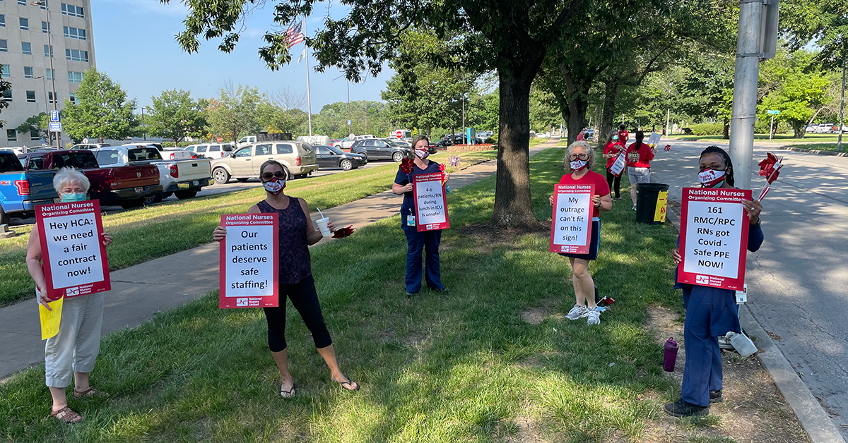 Nurses hold sign with various demands from HCA