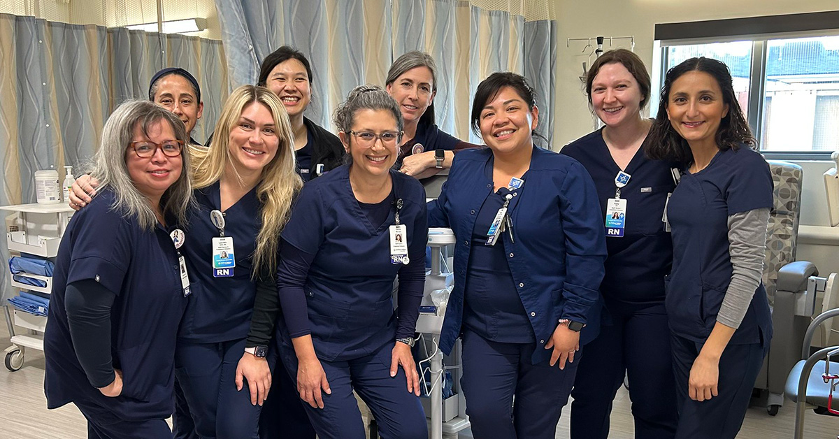 Group of nurses inside hospital smiling