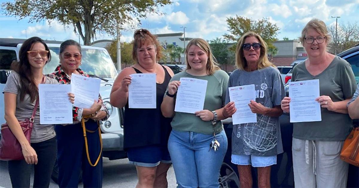 Group pic of Trinity behavioral health unit nurses marching on the boss.