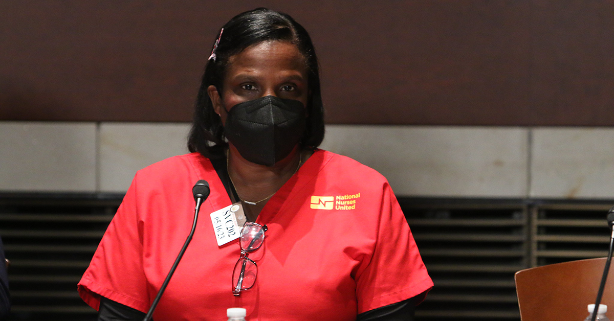 NNU and NYSNA President Nancy Hagans in front of microphone