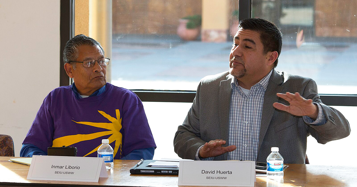 nmar Liborio, janitor at Tech industry, SEIU-USMM listen to David Huerta, President, SEIU-USWW