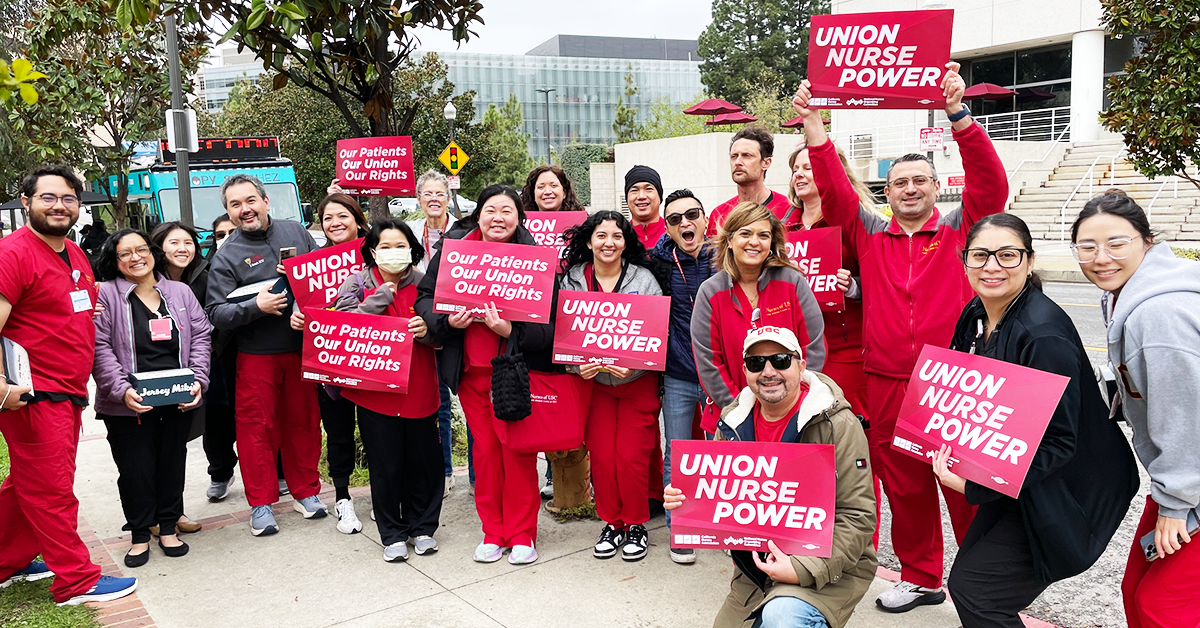 USC Keck, Norris nurses holding signs "Union Nurse Power" and "Our Patients, Our Union, Our Rights"