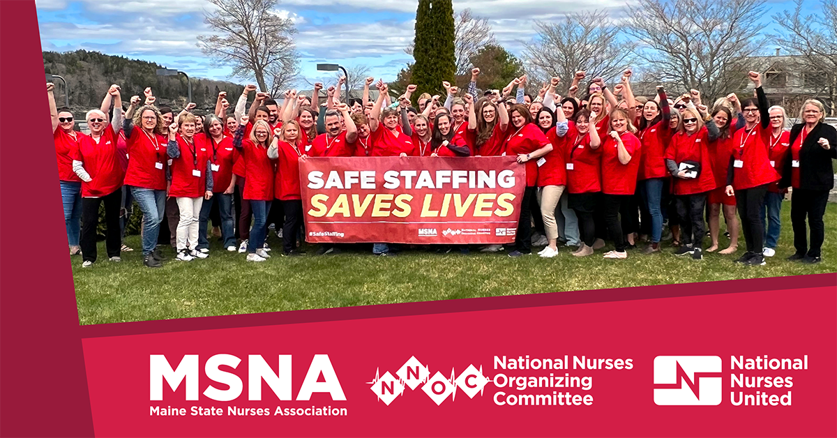 Many MSNA/NNOC nurses raise fists with banner "Safe staffing saves lives"