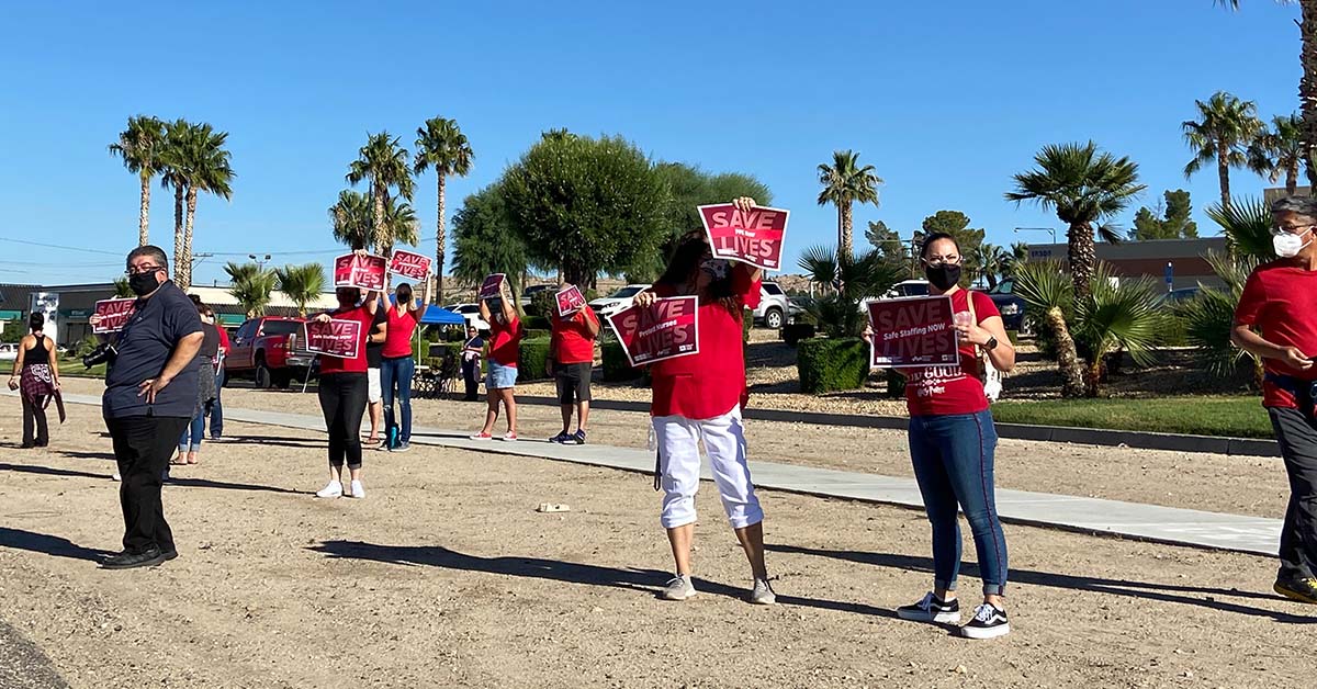 Nurses outside St. Mary Apple Valley hospital holding signs calling for nurse and patient safety