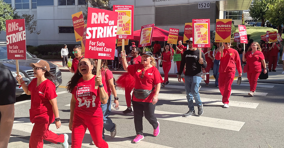 Nurses on strike line outside hospital