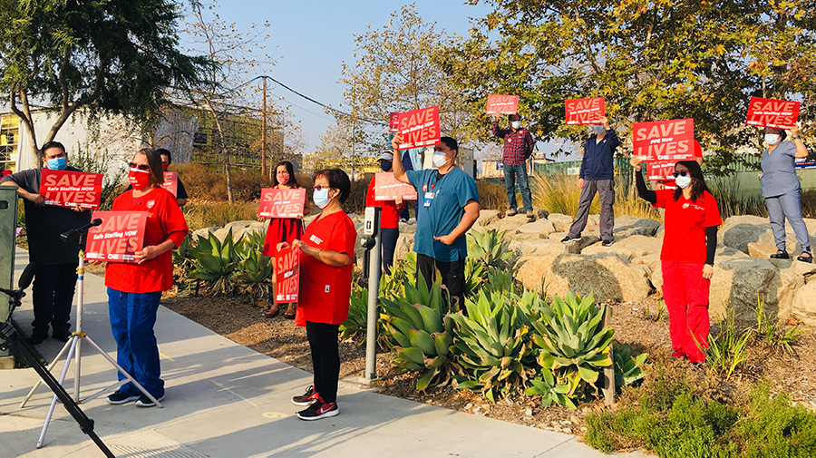 RNs and Caregivers from Palomar Health holding a press conference