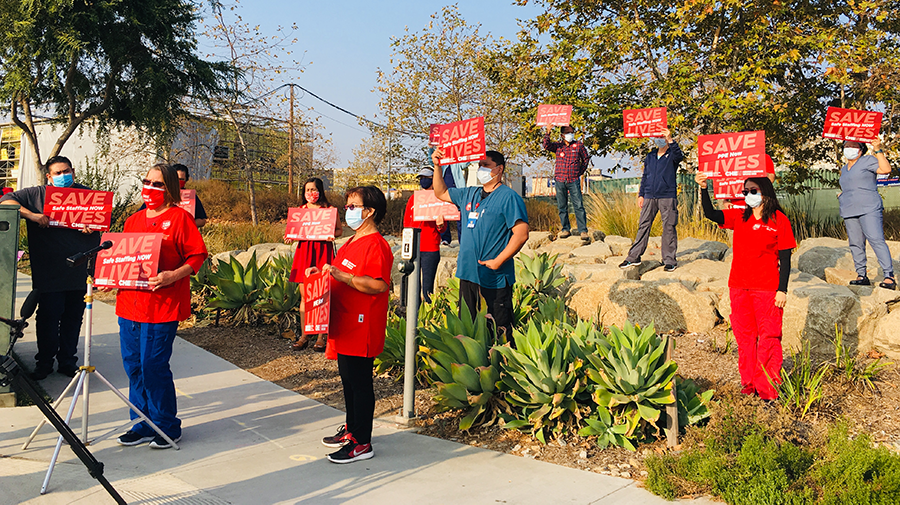 RNs and Caregivers from Palomar Health holding a press conference 