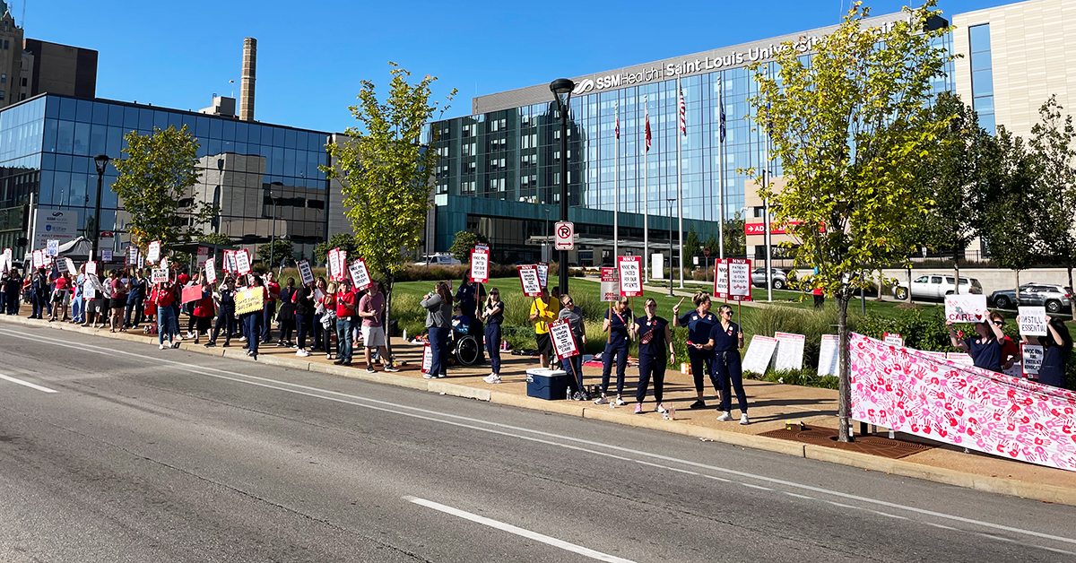 Nurses picketing in front of SSM Health Saint Louis University Hospital in St. Louis, Mo.
