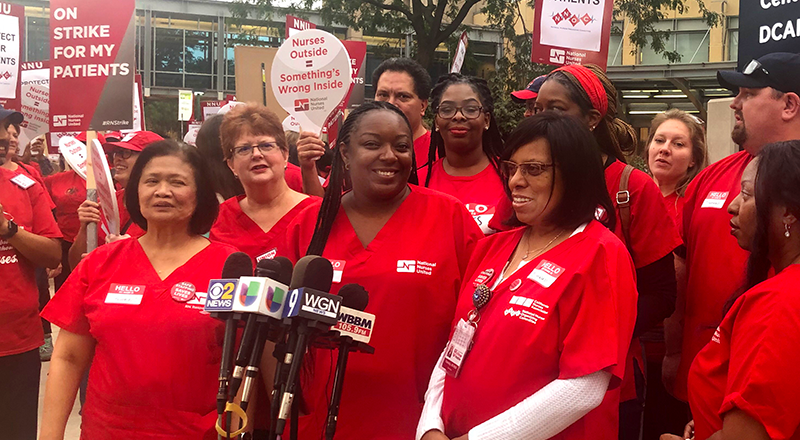 Nurses talking to press