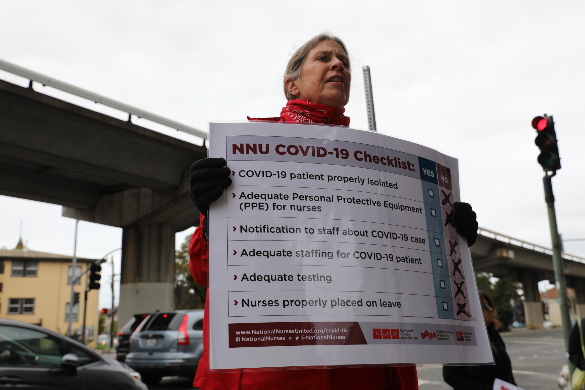 nurse holding sign