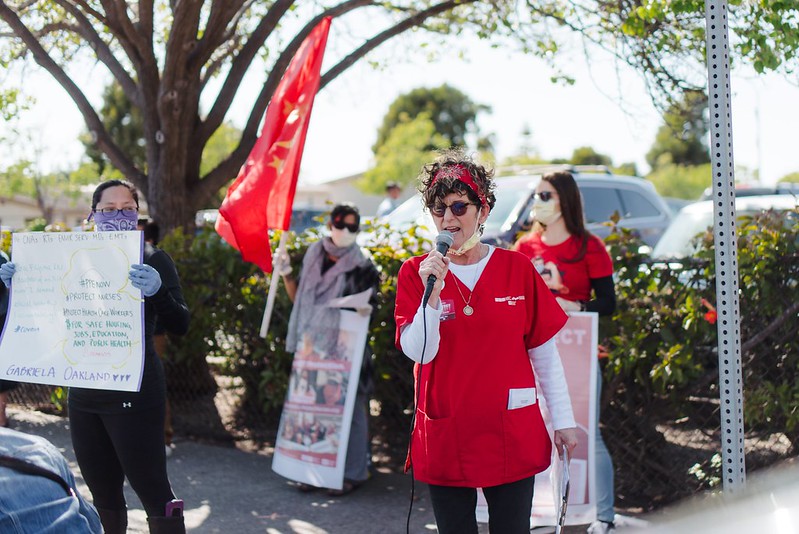 Nurse speaking at action