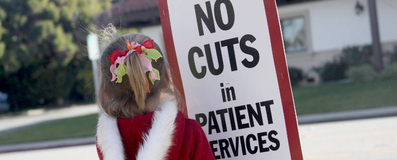 No cuts in patient services sign
