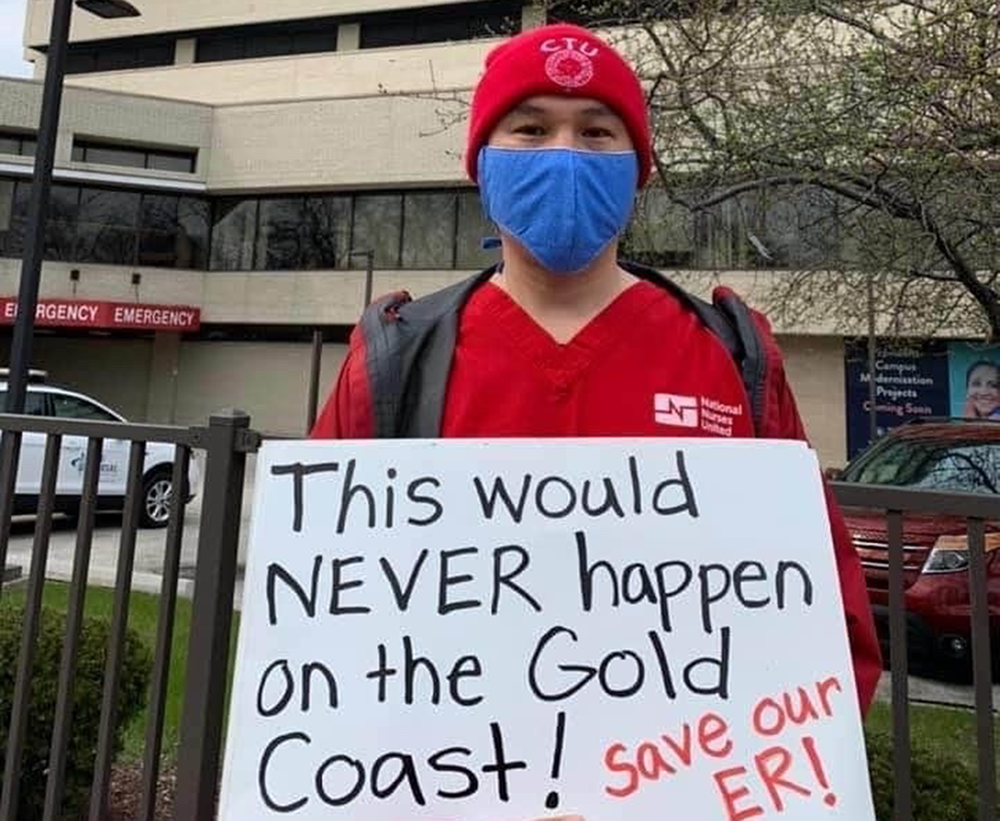 Nurses hold sign "Protect our ER"