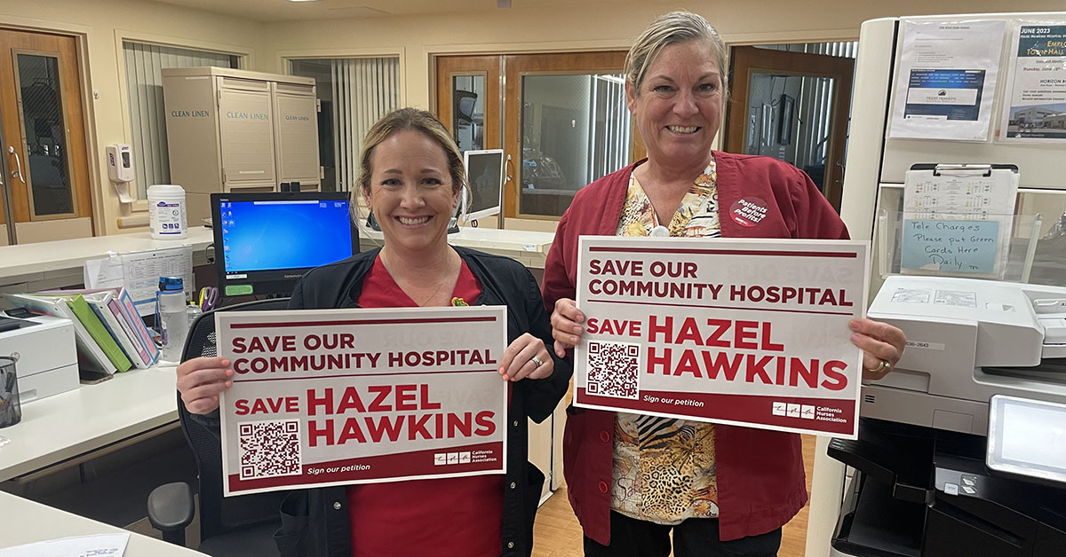 Nurses holding "Save Hazel Hawkins" signs