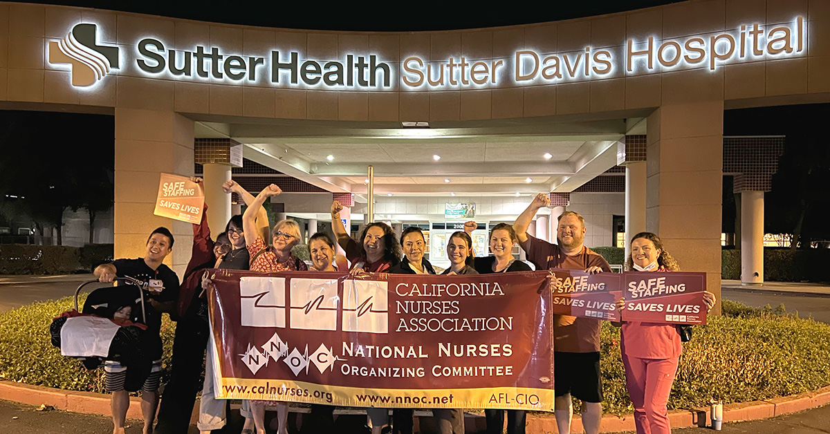 Nurses at Sutter Davis holding up California Nurses Association banner.