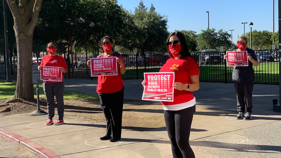 San Joaquin County nurses hold signs "Protect Nurses"