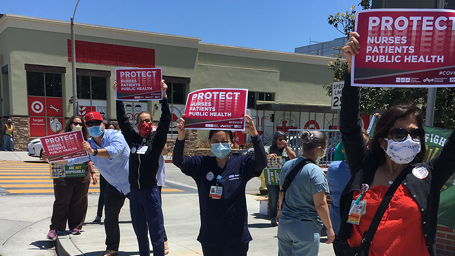Nurses holds sign "Protect Nurses"