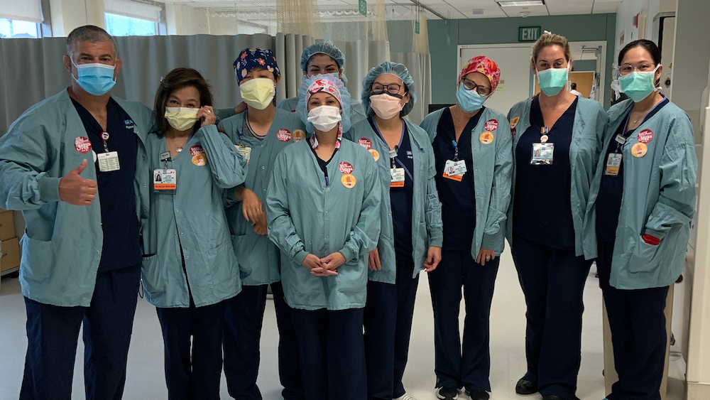 UCLA nurses wearing buttons supporting safe staffing ratios