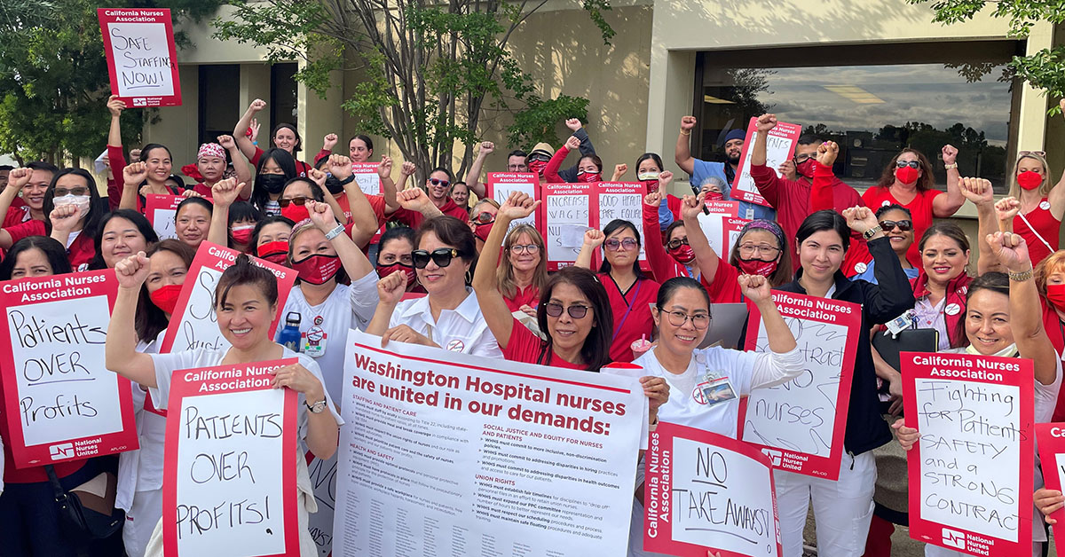 WHHS nurses gathered holding signs in support of safe staffing.