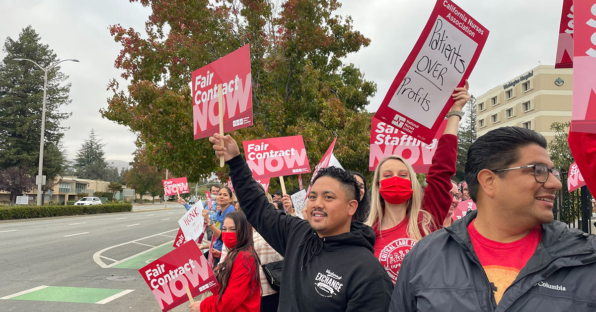 Washington Hospital nurses hold signs in support of a fair contract