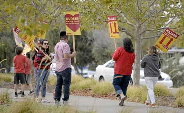 Nurses walk a picket line