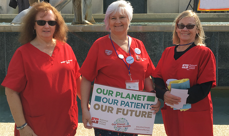 Florida nurses holding sign